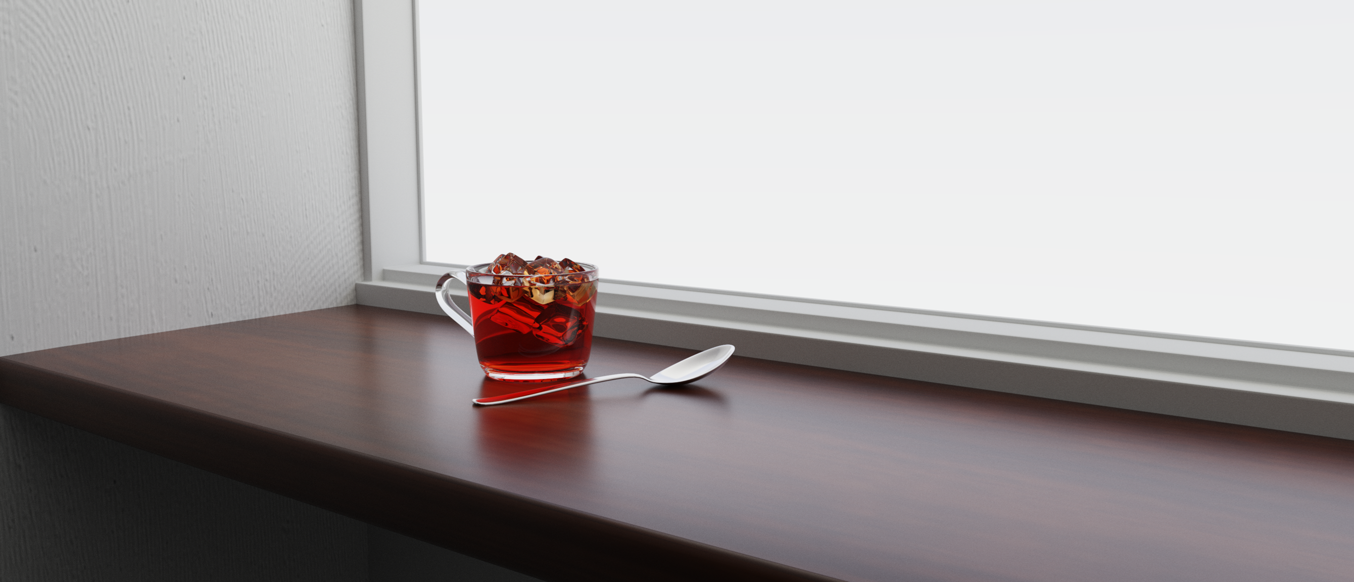 a windowsil scene with a cup of tea and a metal spoon